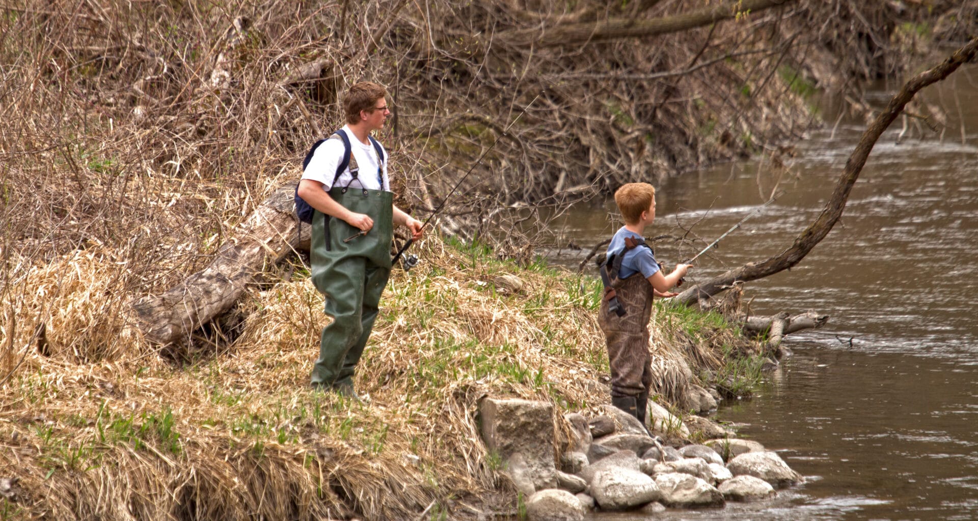 boys fishing in river near Marshall MN