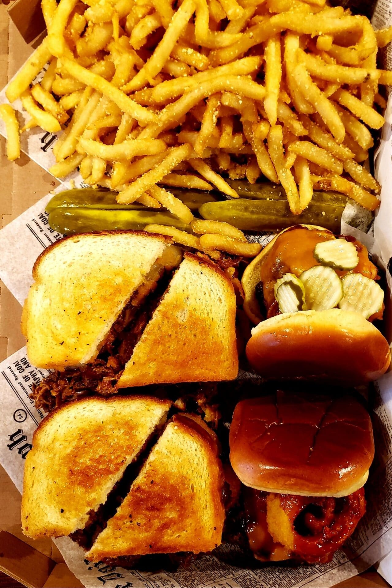 Two sandwiches, 2 Burgers, Pickles & Fries