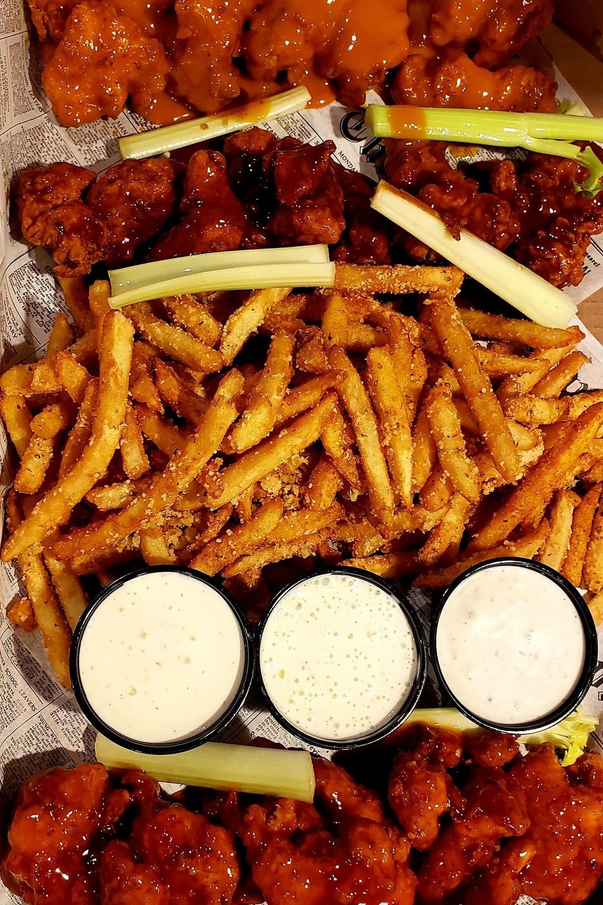 Wing platter with ranch, french fries, and celery