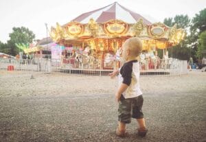 Lyon County Fair - Child with Merry-go-round