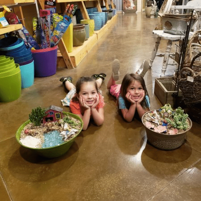 girls with fairy gardens at Greenwood Nursery